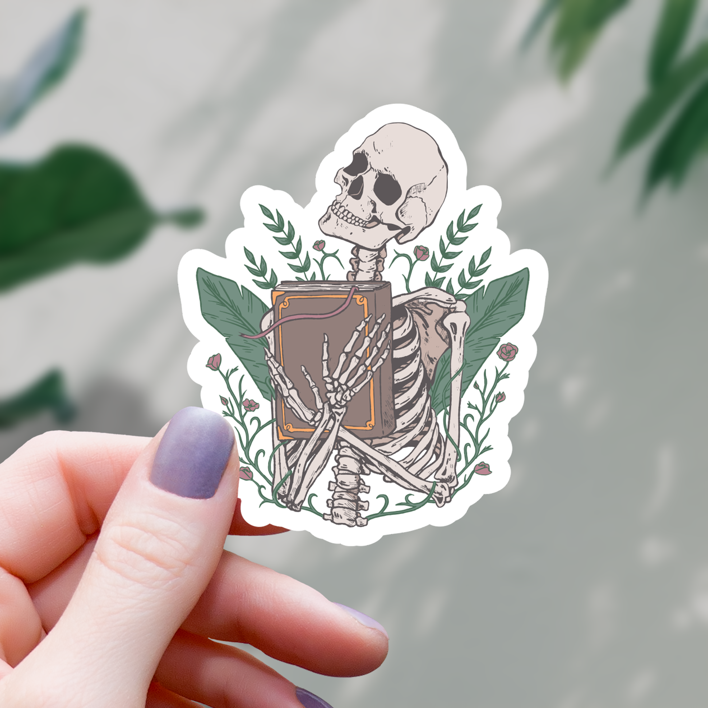Skeleton Holding a Book Sticker - 3"